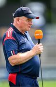 5 July 2025; Cork manager Joe Carroll is interviewed by TG4 before the TG4 All-Ireland Ladies Football Senior Championship quarter-final match between Dublin and Cork at Parnell Park in Dublin. Photo by Seb Daly/Sportsfile