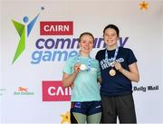 5 July 2025; Siobhan O'Mahoney, left, who won Gold in the Girls under-16 50m Breastroke and Lainey Costello who won Bronze in the under-16 50m Freestyle both from from Brendan's Oakpark Tralee community games team Co Kerry during day one of the Cairn Community Games National Swimming, Quiz, Chess, Draughts and Gymnastics Finals 2025 at The Watershed in Kilkenny. Photo by Matt Browne/Sportsfile