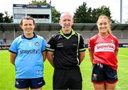5 July 2025; Referee Brendan Rice with Dublin captain Leah Caffrey and Cork captain Sarah Leahy before the TG4 All-Ireland Ladies Football Senior Championship quarter-final match between Dublin and Cork at Parnell Park in Dublin. Photo by Seb Daly/Sportsfile