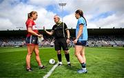 5 July 2025; Referee Brendan Rice with Dublin captain Leah Caffrey and Cork captain Sarah Leahy before the TG4 All-Ireland Ladies Football Senior Championship quarter-final match between Dublin and Cork at Parnell Park in Dublin. Photo by Seb Daly/Sportsfile