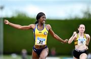 5 July 2025; Precious Akpe-Moses of Blackrock AC, Louth, left, celebrates winning the U20 women 100m during the 123.ie National U20 & U23 Championships at Tullamore Harriers Athletics Club in Tullamore, Offaly. Photo by Sam Barnes/Sportsfile