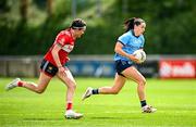 5 July 2025; Sinéad Goldrick of Dublin in action against Hannah Looney of Cork during the TG4 All-Ireland Ladies Football Senior Championship quarter-final match between Dublin and Cork at Parnell Park in Dublin. Photo by Seb Daly/Sportsfile