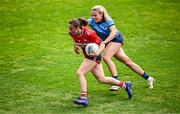 5 July 2025; Melissa Duggan of Cork in action against Nicole Owens of Dublin during the TG4 All-Ireland Ladies Football Senior Championship quarter-final match between Dublin and Cork at Parnell Park in Dublin. Photo by Seb Daly/Sportsfile