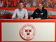 5 July 2025; Shelbourne head coach Joey O'Brien signs his contract alongside chief executive officer Tomás Quinn at Tolka Park in Dublin. Photo by David Fitzgerald/Sportsfile