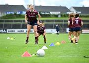 5 July 2025; Áine O'Neill of Galway, 12, warms up alongside her team-mates before the TG4 All-Ireland Ladies Football Senior Championship quarter-final match between Galway and Waterford at Tuam Stadium in Galway. Photo by Piaras Ó Mídheach/Sportsfile