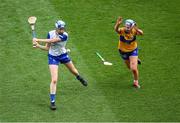5 July 2025; Mairéad O'Brien of Waterford in action against Aoife Andersen of Clare during the Glen Dimplex Senior All-Ireland Camogie Championship quarter-final match between Clare and Waterford at Croke Park in Dublin. Photo by Stephen McCarthy/Sportsfile