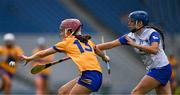 5 July 2025; Róisín Begley of Clare in action against Vikki Falconer of Waterford during the Glen Dimplex Senior All-Ireland Camogie Championship quarter-final match between Clare and Waterford at Croke Park in Dublin. Photo by Ray McManus/Sportsfile
