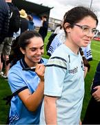 5 July 2025; Niamh Crowley of Dublin sign a young supporter's jersey after the TG4 All-Ireland Ladies Football Senior Championship quarter-final match between Dublin and Cork at Parnell Park in Dublin. Photo by Seb Daly/Sportsfile