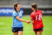 5 July 2025; Leah Caffrey of Dublin and Leah Hallihan of Cork shake hands after the TG4 All-Ireland Ladies Football Senior Championship quarter-final match between Dublin and Cork at Parnell Park in Dublin. Photo by Seb Daly/Sportsfile