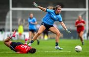 5 July 2025; Kate Sullivan of Dublin in action against Aimee Corcoran of Cork during the TG4 All-Ireland Ladies Football Senior Championship quarter-final match between Dublin and Cork at Parnell Park in Dublin. Photo by Seb Daly/Sportsfile