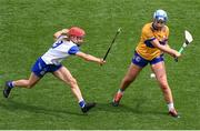 5 July 2025; Aoife Andersen of Clare in action against Lorraine Bray of Waterford during the Glen Dimplex Senior All-Ireland Camogie Championship quarter-final match between Clare and Waterford at Croke Park in Dublin. Photo by Stephen McCarthy/Sportsfile