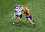 5 July 2025; Vikki Falconer of Waterford in action against Róisin Begley of Clare during the Glen Dimplex Senior All-Ireland Camogie Championship quarter-final match between Clare and Waterford at Croke Park in Dublin. Photo by Stephen McCarthy/Sportsfile