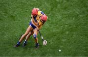 5 July 2025; Jennifer Daly of Clare in action against Lorraine Bray of Waterford during the Glen Dimplex Senior All-Ireland Camogie Championship quarter-final match between Clare and Waterford at Croke Park in Dublin. Photo by Stephen McCarthy/Sportsfile