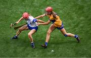 5 July 2025; Jennifer Daly of Clare in action against Lorraine Bray of Waterford during the Glen Dimplex Senior All-Ireland Camogie Championship quarter-final match between Clare and Waterford at Croke Park in Dublin. Photo by Stephen McCarthy/Sportsfile