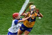 5 July 2025; Lorraine Bray of Waterford in action against Lynda Daly of Clare during the Glen Dimplex Senior All-Ireland Camogie Championship quarter-final match between Clare and Waterford at Croke Park in Dublin. Photo by Stephen McCarthy/Sportsfile