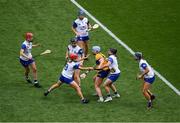 5 July 2025; Caoimhe Cahill of Clare is surrounded by Waterford players during the Glen Dimplex Senior All-Ireland Camogie Championship quarter-final match between Clare and Waterford at Croke Park in Dublin. Photo by Stephen McCarthy/Sportsfile