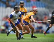 5 July 2025; Alannah McNulty of Waterford in action against Caoimhe Carmody of Clare during the Glen Dimplex Senior All-Ireland Camogie Championship quarter-final match between Clare and Waterford at Croke Park in Dublin. Photo by John Sheridan/Sportsfile