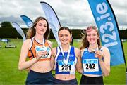 5 July 2025; U20 Women's long jump medallists, Riona Doherty of Finn Valley AC, Donegal, gold, centre,  Aine Frawley of St Marys AC, Limerick, silver, left, and Katie Deverell of Tullamore Harriers AC, Offaly, bronze, right,  during the 123.ie National U20 & U23 Championships at Tullamore Harriers Athletics Club in Tullamore, Offaly. Photo by Sam Barnes/Sportsfile