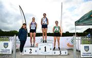 5 July 2025; Athletics Ireland President Bríd Golden, left, with U23 1500m medallists, Eimear Maher of Dundrum South Dublin AC, gold, centre, Cara Laverty of Finn Valley AC, Donegal, silver, left, and Holly Carroll of Blarney/Inniscara AC, Cork, right, bronze, during the 123.ie National U20 & U23 Championships at Tullamore Harriers Athletics Club in Tullamore, Offaly. Photo by Sam Barnes/Sportsfile