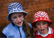 5 July 2025; Cousins, Dublin supporter Aoife Barry, age 11, and Cork supporter Lorcan Donovan, age 9, arrive before the GAA Hurling All-Ireland Senior Championship semi-final match between Cork and Dublin at Croke Park in Dublin. Photo by David Fitzgerald/Sportsfile