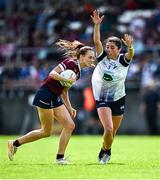 5 July 2025; Olivia Divilly of Galway in action against Hannah Power of Waterford during the TG4 All-Ireland Ladies Football Senior Championship quarter-final match between Galway and Waterford at Tuam Stadium in Galway. Photo by Piaras Ó Mídheach/Sportsfile