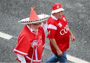 5 July 2025; Cork supporters arrive for the GAA Hurling All-Ireland Senior Championship semi-final match between Cork and Dublin at Croke Park in Dublin. Photo by Stephen McCarthy/Sportsfile