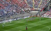 5 July 2025; Dublin players warm-up in front of Hill 16 before the GAA Hurling All-Ireland Senior Championship semi-final match between Cork and Dublin at Croke Park in Dublin. Photo by Stephen McCarthy/Sportsfile