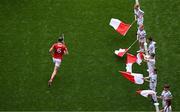 5 July 2025; Cork captain Robert Downey leads his side out for the GAA Hurling All-Ireland Senior Championship semi-final match between Cork and Dublin at Croke Park in Dublin. Photo by Stephen McCarthy/Sportsfile