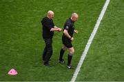 5 July 2025; Referee Johnny Murphy has his radio technology adjusted before the GAA Hurling All-Ireland Senior Championship semi-final match between Cork and Dublin at Croke Park in Dublin. Photo by Stephen McCarthy/Sportsfile