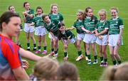 5 July 2025; Players from the half-time mini games, including from Dunmore MacHales in green, await the arrival of the Galway players before the TG4 All-Ireland Ladies Football Senior Championship quarter-final match between Galway and Waterford at Tuam Stadium in Galway. Photo by Piaras Ó Mídheach/Sportsfile