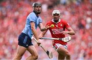 5 July 2025; Ronan Hayes of Dublin in action against Tim O'Mahony of Cork during the GAA Hurling All-Ireland Senior Championship semi-final match between Cork and Dublin at Croke Park in Dublin. Photo by Ramsey Cardy/Sportsfile