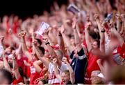 5 July 2025; Cork supporters celebrate during the GAA Hurling All-Ireland Senior Championship semi-final match between Cork and Dublin at Croke Park in Dublin. Photo by Ramsey Cardy/Sportsfile