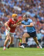 5 July 2025; Sean Currie of Dublin in action against Niall O'Leary of Cork during the GAA Hurling All-Ireland Senior Championship semi-final match between Cork and Dublin at Croke Park in Dublin. Photo by John Sheridan/Sportsfile