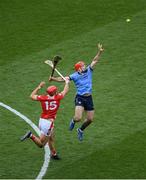 5 July 2025; Paddy Smyth of Dublin in action against Brian Hayes of Cork during the GAA Hurling All-Ireland Senior Championship semi-final match between Cork and Dublin at Croke Park in Dublin. Photo by Stephen McCarthy/Sportsfile