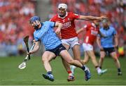 5 July 2025; Conor Burke of Dublin in action against Tim O'Mahony of Cork during the GAA Hurling All-Ireland Senior Championship semi-final match between Cork and Dublin at Croke Park in Dublin. Photo by David Fitzgerald/Sportsfile
