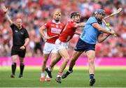 5 July 2025; John Hetherton of Dublin in action against Eoin Downey of Cork during the GAA Hurling All-Ireland Senior Championship semi-final match between Cork and Dublin at Croke Park in Dublin. Photo by David Fitzgerald/Sportsfile