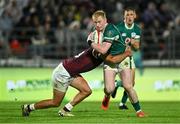5 July 2025; Jamie Osborne of Ireland is tackled by Demur Tapladze of Georgia during the International Rugby Test match between Georgia and Ireland at at Mikheil Meskhi Stadium in Tbilisi, Georgia. Photo by Brendan Moran/Sportsfile
