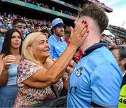 5 July 2025; Conor Burke of Dublin is concoled by his mother, Jackie, after the GAA Hurling All-Ireland Senior Championship semi-final match between Cork and Dublin at Croke Park in Dublin. Photo by Ray McManus/Sportsfile