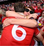 5 July 2025; Robert Downey of Cork celebrates with his mother Angela after the GAA Hurling All-Ireland Senior Championship semi-final match between Cork and Dublin at Croke Park in Dublin. Photo by David Fitzgerald/Sportsfile