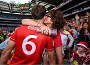 5 July 2025; Robert Downey of Cork celebrates with his mother Angela after the GAA Hurling All-Ireland Senior Championship semi-final match between Cork and Dublin at Croke Park in Dublin. Photo by David Fitzgerald/Sportsfile