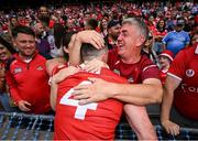 5 July 2025; Seán O'Donoghue of Cork celebrates with his parents Paddy and Yvonne after the GAA Hurling All-Ireland Senior Championship semi-final match between Cork and Dublin at Croke Park in Dublin. Photo by David Fitzgerald/Sportsfile