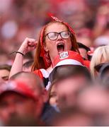 5 July 2025; A Cork supporter celebrates during the GAA Hurling All-Ireland Senior Championship semi-final match between Cork and Dublin at Croke Park in Dublin. Photo by Ramsey Cardy/Sportsfile