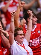 5 July 2025; Cork supporters celebrate during the GAA Hurling All-Ireland Senior Championship semi-final match between Cork and Dublin at Croke Park in Dublin. Photo by Ramsey Cardy/Sportsfile