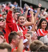 5 July 2025; Cork supporters celebrate a score during the GAA Hurling All-Ireland Senior Championship semi-final match between Cork and Dublin at Croke Park in Dublin. Photo by David Fitzgerald/Sportsfile