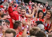 5 July 2025; Cork supporters celebrate a score during the GAA Hurling All-Ireland Senior Championship semi-final match between Cork and Dublin at Croke Park in Dublin. Photo by David Fitzgerald/Sportsfile