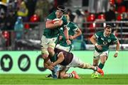 5 July 2025; Darragh Murray of Ireland is tackled by Vano Karkadze of Georgia during the International Rugby Test match between Georgia and Ireland at at Mikheil Meskhi Stadium in Tbilisi, Georgia. Photo by Brendan Moran/Sportsfile