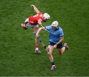 5 July 2025; Conor Donohoe of Dublin in action against Tim O'Mahony of Cork during the GAA Hurling All-Ireland Senior Championship semi-final match between Cork and Dublin at Croke Park in Dublin. Photo by Stephen McCarthy/Sportsfile