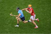 5 July 2025; Sean Currie of Dublin in action against Declan Dalton of Cork during the GAA Hurling All-Ireland Senior Championship semi-final match between Cork and Dublin at Croke Park in Dublin. Photo by Stephen McCarthy/Sportsfile