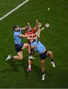 5 July 2025; Mark Coleman of Cork in action against Sean Currie, right, and Ronan Hayes of Dublin  during the GAA Hurling All-Ireland Senior Championship semi-final match between Cork and Dublin at Croke Park in Dublin. Photo by Stephen McCarthy/Sportsfile