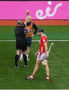 5 July 2025; Dublin maor uisce David O'Callaghan is shown a yellow card by referee Johnny Murphy during the GAA Hurling All-Ireland Senior Championship semi-final match between Cork and Dublin at Croke Park in Dublin. Photo by Stephen McCarthy/Sportsfile